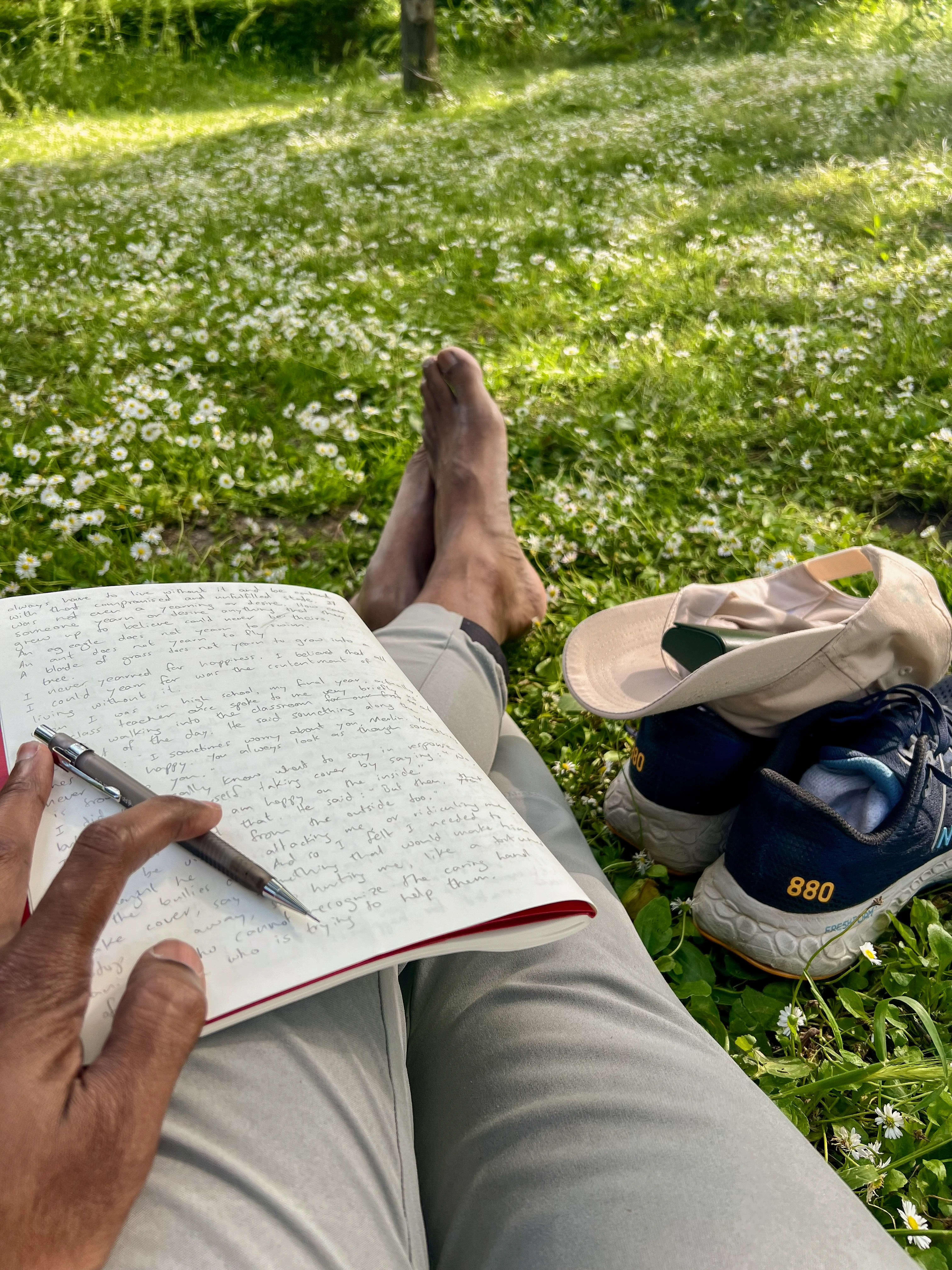 A notebook resting on a bench in Madrid's Retiro Park.
